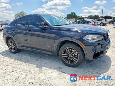Czwarte zdjęcie samochodu z boku: 2016 BMW X6 XDRIVE35I VIN:5UXKU2C58G0N79585 - miniatura