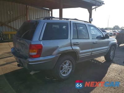 Trzecie zdjęcie samochodu z tyłu: 1999 JEEP GRAND CHEROKEE LIMITED VIN:1J4GW68N0XC527880 - miniatura