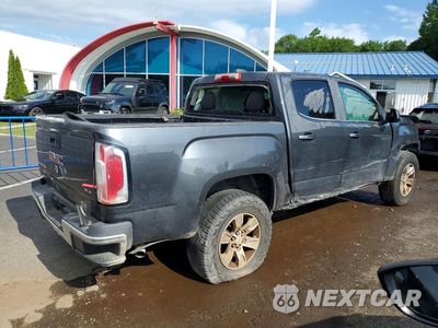 Trzecie zdjęcie samochodu z tyłu: 2016 GMC CANYON SLE VIN:1GTG5CE33G1257713 - miniatura