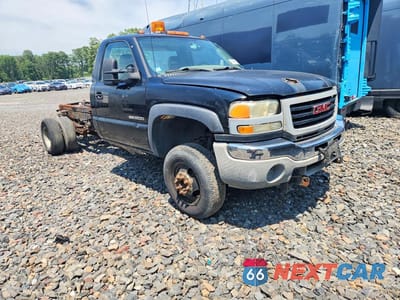Czwarte zdjęcie samochodu z boku: 2004 GMC NEW SIERRA C3500 VIN:1GDJC34U24E285170 - miniatura