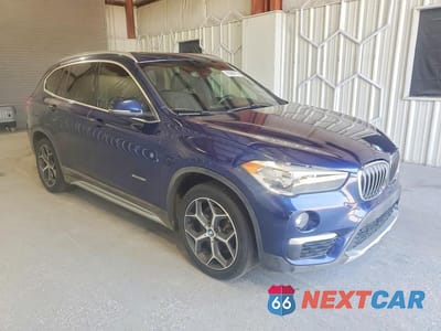 Czwarte zdjęcie samochodu z boku: 2018 BMW X1 XDRIVE28I VIN:WBXHT3C38J5K23024 - miniatura