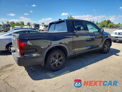Trzecie zdjęcie samochodu z tyłu: 2018 HONDA RIDGELINE BLACK EDITION VIN:5FPYK3F80JB000473 - miniatura