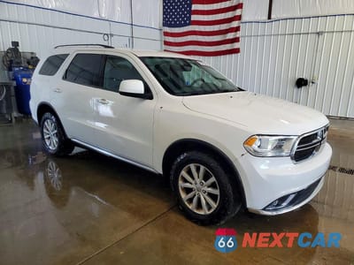 Czwarte zdjęcie samochodu z boku: 2015 DODGE DURANGO SXT VIN:1C4RDJAG1FC710190 - miniatura