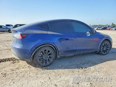 Trzecie zdjęcie samochodu z tyłu: 2023 TESLA MODEL Y VIN:7SAYGDEE0PA163530 - miniatura