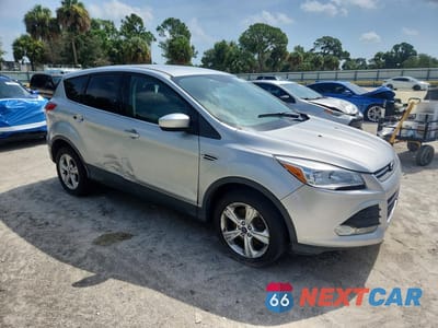 Czwarte zdjęcie samochodu z boku: 2015 FORD ESCAPE SE VIN:1FMCU9G97FUA32418 - miniatura