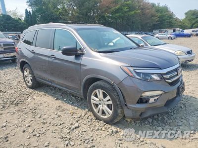 Czwarte zdjęcie samochodu z boku: 2016 HONDA PILOT LX VIN:5FNYF6H12GB042862 - miniatura