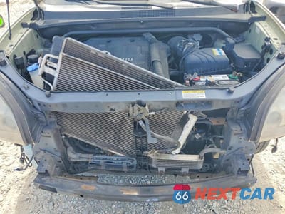 Zdjęcie 12 z 14 samochodu: 2007 HYUNDAI TUCSON SE VIN:KM8JN12D57U582946 - miniatura