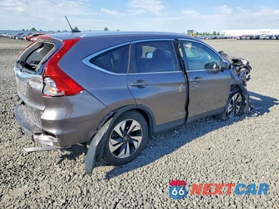 Trzecie zdjęcie samochodu z tyłu: 2016 HONDA CR-V TOURING VIN:5J6RM4H90GL133995 - miniatura