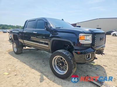 Czwarte zdjęcie samochodu z boku: 2016 GMC SIERRA K2500 DENALI VIN:1GT12UE81GF238144 - miniatura