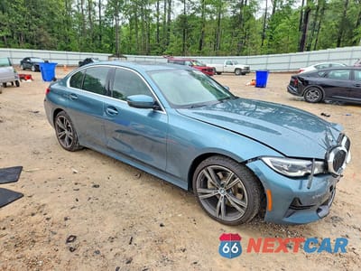 Czwarte zdjęcie samochodu z boku: 2021 BMW 330E VIN:3MW5P7J08M8B77283 - miniatura