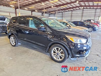 Czwarte zdjęcie samochodu z boku: 2017 FORD ESCAPE SE VIN:1FMCU0GD3HUE64894 - miniatura