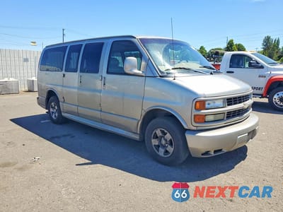 Czwarte zdjęcie samochodu z boku: 2002 CHEVROLET EXPRESS G1500 VIN:1GBFG65R121102649 - miniatura
