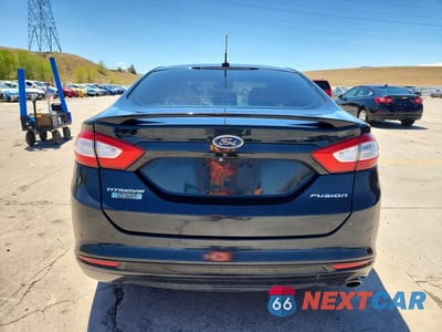 Zdjęcie 6 z 12 samochodu: 2014 FORD FUSION TITANIUM PHEV VIN:3FA6P0SU7ER136094 - miniatura