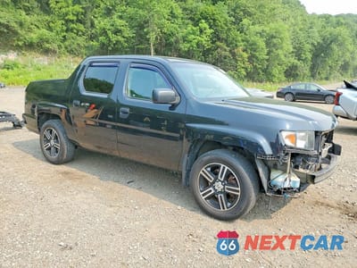 Czwarte zdjęcie samochodu z boku: 2012 HONDA RIDGELINE SPORT VIN:5FPYK1F74CB454854 - miniatura