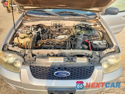 Zdjęcie 12 z 13 samochodu: 2006 FORD ESCAPE HEV VIN:1FMCU96H96KA20615 - miniatura