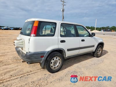 Trzecie zdjęcie samochodu z tyłu: 1999 HONDA CR-V LX VIN:JHLRD2846XC003785 - miniatura