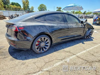 Trzecie zdjęcie samochodu z tyłu: 2021 TESLA MODEL 3 VIN:5YJ3E1EC2MF868001 - miniatura