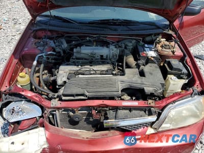 Zdjęcie 11 z 12 samochodu: 2001 MAZDA PROTEGE DX VIN:JM1BJ222X10434766 - miniatura