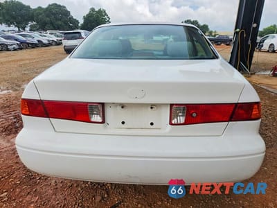 Zdjęcie 6 z 12 samochodu: 2001 TOYOTA CAMRY LE VIN:4T1BF22KX1U959932 - miniatura