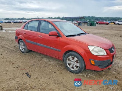 Czwarte zdjęcie samochodu z boku: 2009 KIA RIO BASE VIN:KNADE223996499071 - miniatura