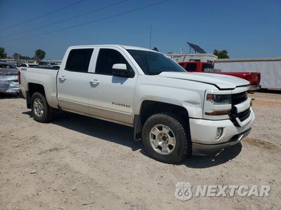 Czwarte zdjęcie samochodu z boku: 2018 CHEVROLET SILVERADO K1500 LT VIN:3GCUKREC1JG269396 - miniatura