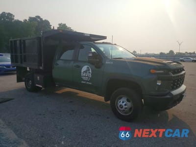 Czwarte zdjęcie samochodu z boku: 2021 CHEVROLET SILVERADO C3500 DUMP TRUCK VIN:1GB4WREY5MF311532 - miniatura