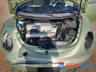 Zdjęcie 11 z 12 samochodu: 2008 VOLKSWAGEN NEW BEETLE CONVERTIBLE SE VIN:3VWRF31Y78M411557 - miniatura