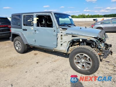 Czwarte zdjęcie samochodu z boku: 2014 JEEP WRANGLER UNLIMITED RUBICON VIN:1C4BJWFG0EL297144 - miniatura
