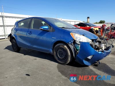 Czwarte zdjęcie samochodu z boku: 2012 TOYOTA PRIUS C TWO VIN:JTDKDTB32C1527638 - miniatura