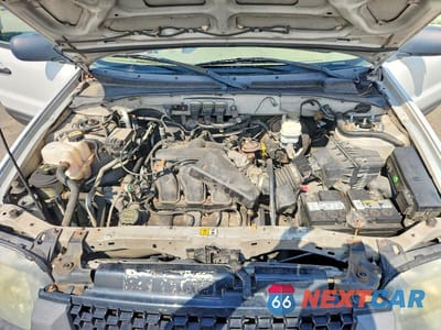 Zdjęcie 12 z 13 samochodu: 2006 FORD ESCAPE XLT VIN:1FMYU03146KB08965 - miniatura