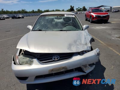 Piąte zdjęcie samochodu w środku: 2002 TOYOTA COROLLA LE VIN:1NXBR12E22Z584227 - miniatura