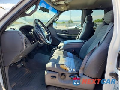 Zdjęcie 7 z 12 samochodu: 2001 FORD F150 VIN:1FTRX08L91KA08248 - miniatura