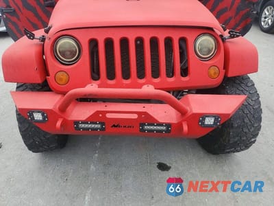 Zdjęcie 11 z 12 samochodu: 2007 JEEP WRANGLER SAHARA VIN:1J8GA59197L214801 - miniatura