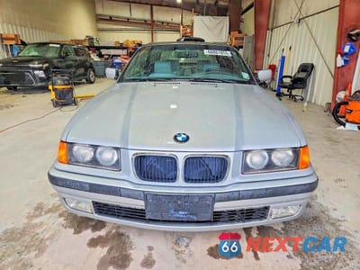 Piąte zdjęcie samochodu w środku: 1998 BMW 323 IC AUTOMATIC VIN:WBABJ8322WEM21728 - miniatura
