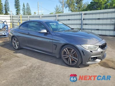 Czwarte zdjęcie samochodu z boku: 2015 BMW 435 I VIN:WBA3T3C58F5A40335 - miniatura