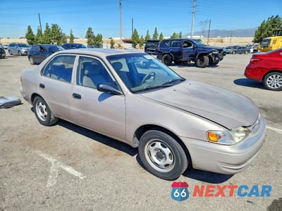 Czwarte zdjęcie samochodu z boku: 1999 TOYOTA COROLLA VE VIN:1NXBR12E1XZ140053 - miniatura