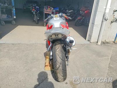 Czwarte zdjęcie samochodu z boku: 2002 HONDA CBR600 F4 VIN:JH2PC35082M304776 - miniatura