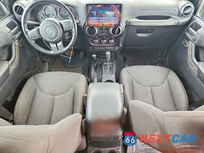 Zdjęcie 8 z 13 samochodu: 2016 JEEP WRANGLER UNLIMITED SPORT VIN:1C4BJWDG8GL263880 - miniatura