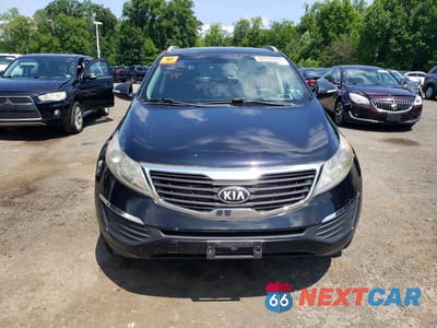 Piąte zdjęcie samochodu w środku: 2013 KIA SPORTAGE LX VIN:KNDPBCA25D7354636 - miniatura