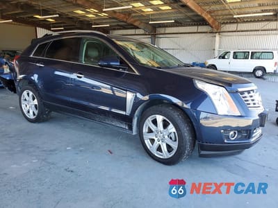 Czwarte zdjęcie samochodu z boku: 2015 CADILLAC SRX PERFORMANCE COLLECTION VIN:3GYFNCE33FS562440 - miniatura