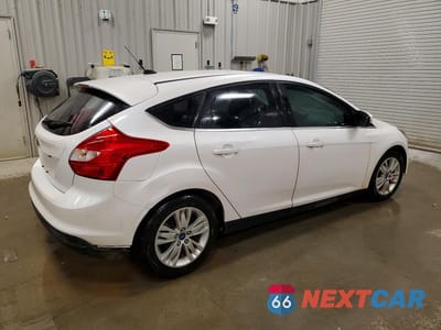 Trzecie zdjęcie samochodu z tyłu: 2012 FORD FOCUS SEL VIN:1FAHP3M26CL206041 - miniatura