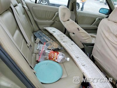 Zdjęcie 10 z 12 samochodu: 2002 INFINITI G20 BASE VIN:JNKCP11A42T503147 - miniatura