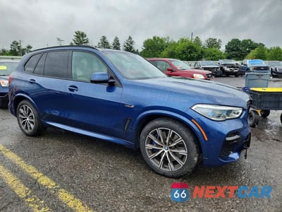 Czwarte zdjęcie samochodu z boku: 2022 BMW X5 XDRIVE45E VIN:5UXTA6C00N9N38160 - miniatura