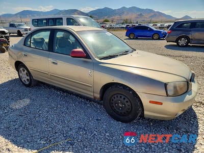 Czwarte zdjęcie samochodu z boku: 2001 HYUNDAI ELANTRA GLS VIN:KMHDN45D91U153228 - miniatura