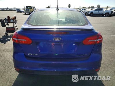 Zdjęcie 6 z 12 samochodu: 2015 FORD FOCUS TITANIUM VIN:1FADP3J29FL232415 - miniatura