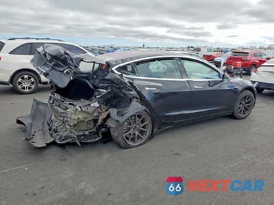 Trzecie zdjęcie samochodu z tyłu: 2018 TESLA MODEL 3 VIN:5YJ3E1EA8JF044109 - miniatura