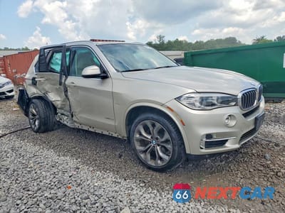 Czwarte zdjęcie samochodu z boku: 2014 BMW X5 XDRIVE35I VIN:5UXKR0C58E0K50775 - miniatura