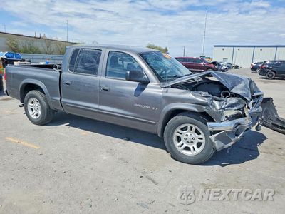 Czwarte zdjęcie samochodu z boku: 2002 DODGE DAKOTA QUAD SLT VIN:1B7HL48N82S660764 - miniatura
