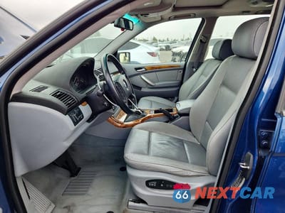 Zdjęcie 7 z 13 samochodu: 2002 BMW X5 3.0I VIN:5UXFA53582LP33005 - miniatura