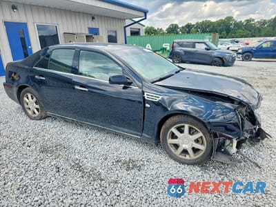 Czwarte zdjęcie samochodu z boku: 2011 CADILLAC STS LUXURY VIN:1G6DW6ED9B0156168 - miniatura